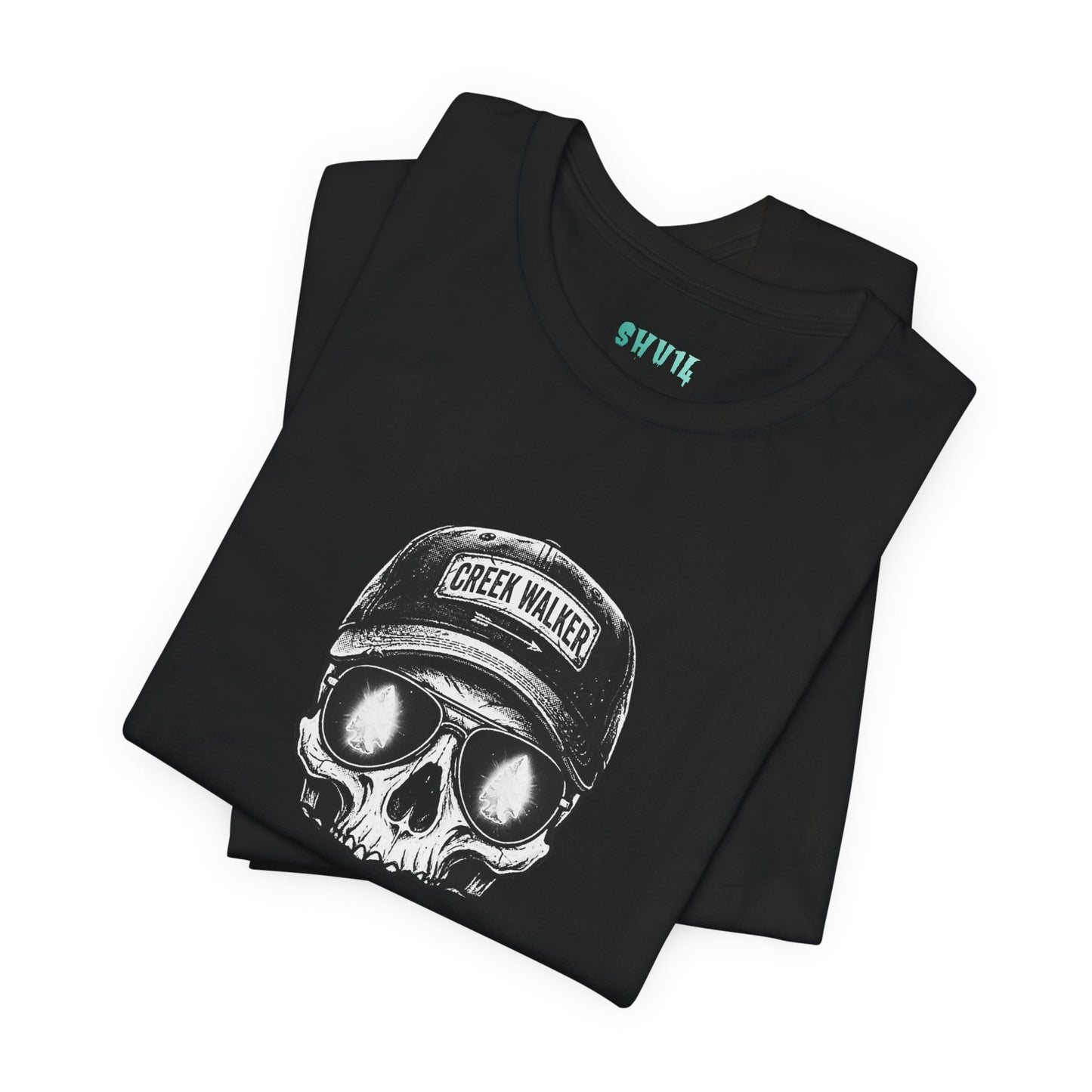 Distressed human skull graphic on a black shirt wearing a Creek Walker baseball cap and aviator sunglasses reflecting a glowing white arrowhead.