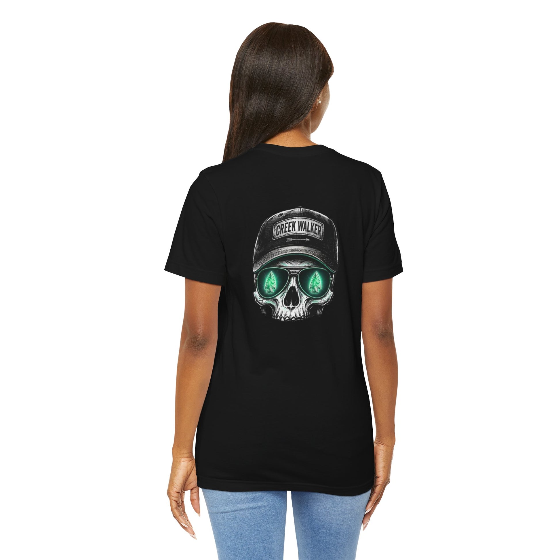  Distressed human skull graphic on a black shirt wearing a Creek Walker baseball cap and aviator sunglasses reflecting a glowing green arrowhead